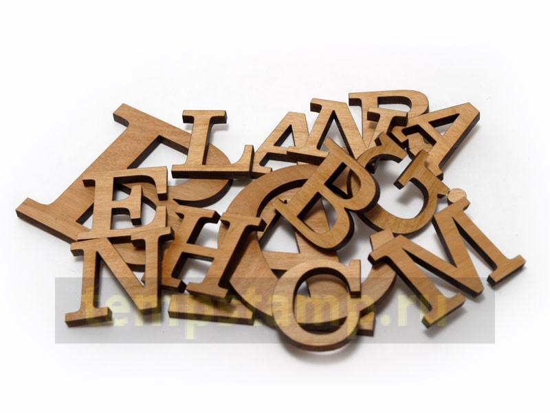 "Carved wooden letters"
