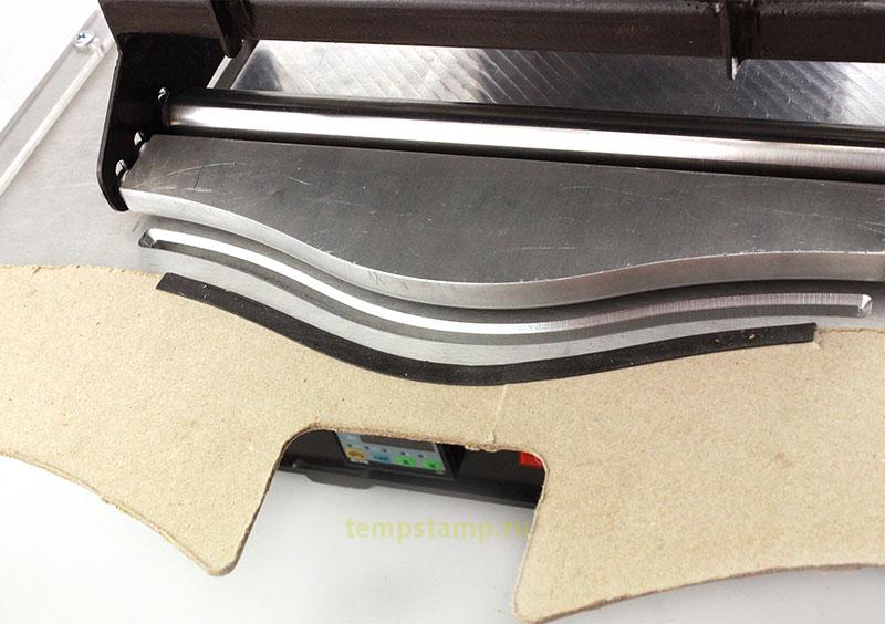 Thermopress for forming soft edges of cardboard products