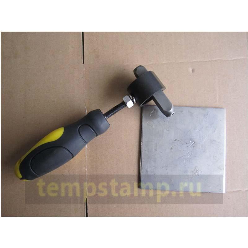 "Safety handle for impact stamps"
